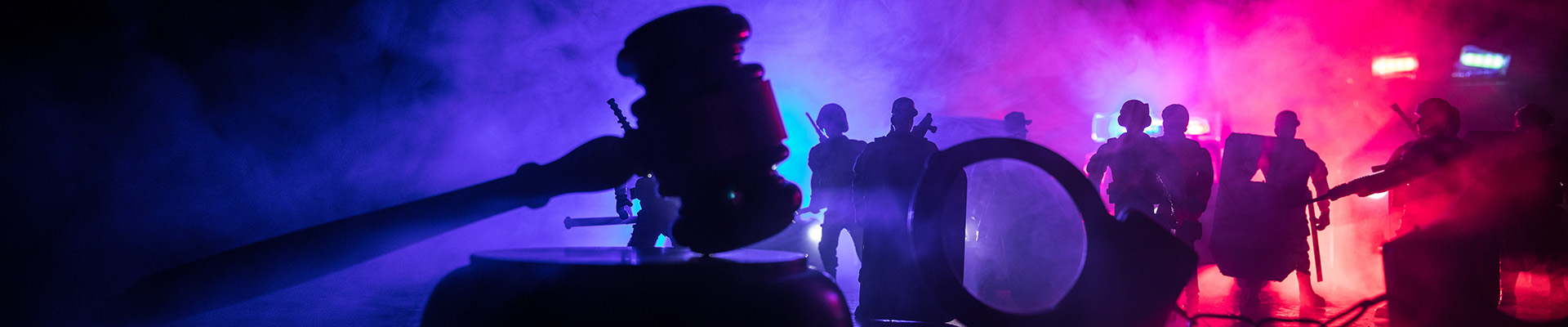 Police lights flashing, gavel, handcuffs